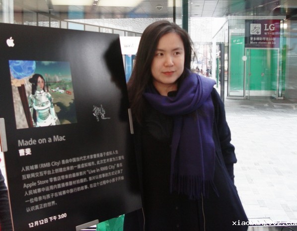 Cao Fei stood in front of the introduction to her work "RMB City"